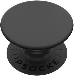 Classic black PopSockets phone grip attached to the back of a smartphone.