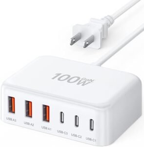 Compact 100W USB C charging station with multiple ports and power cord.