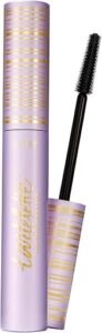 Purple tube of tartelette tubing mascara with its wand against a white background.