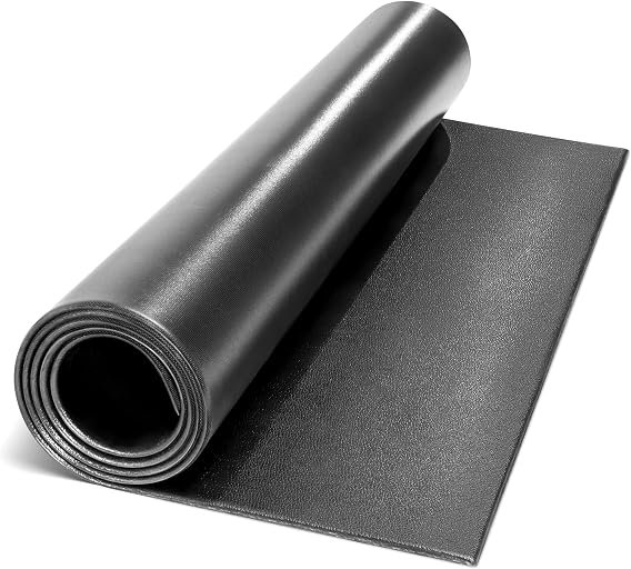Durable black marcy exercise equipment mat protecting a home gym floor.